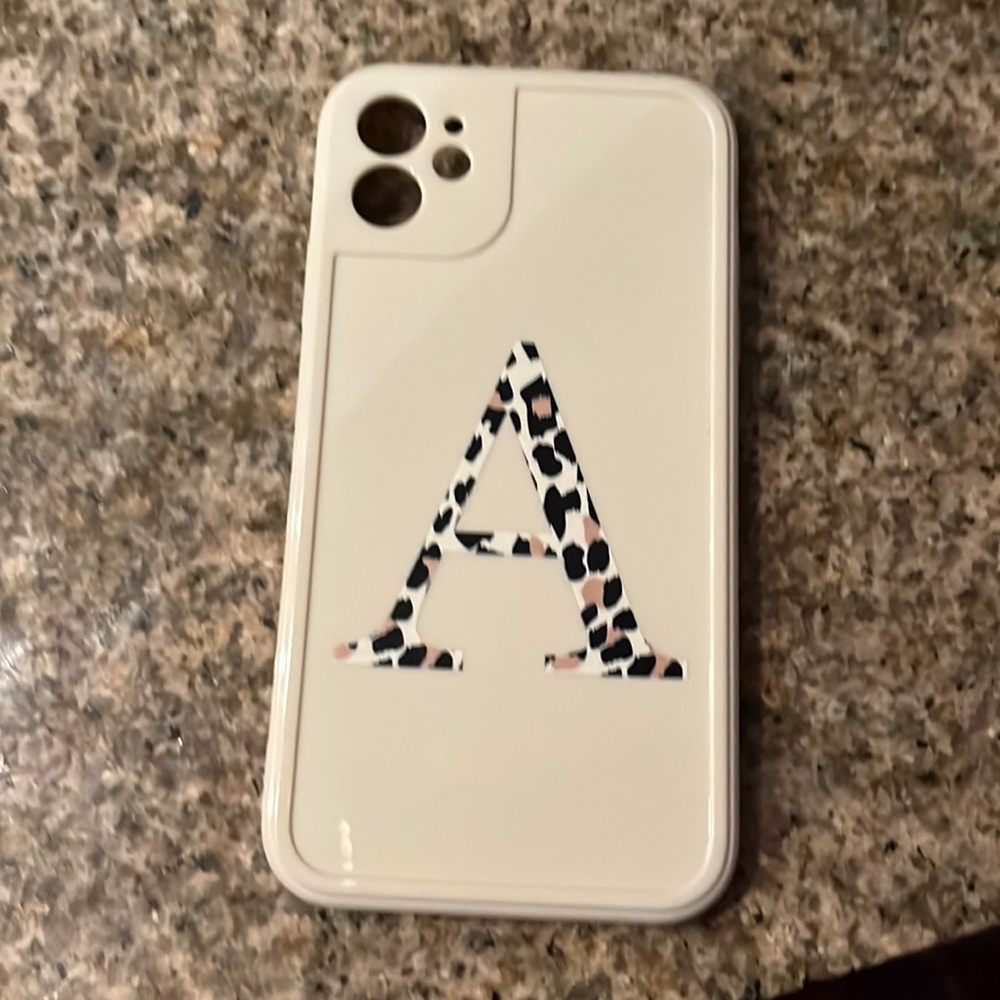 This is for iPhone 11. Brand new. Letter A with Cheetah print.